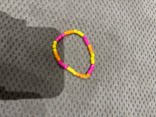 Pulsera Cilindros Naranja, Rosa, Amarillo