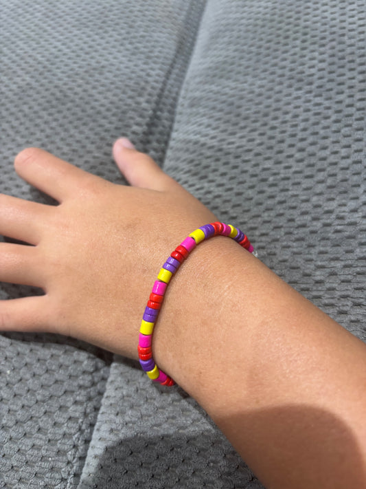 Pulsera De Cilindros Roja, Amarilla, Rosa Y Morada